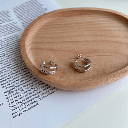 ✨ Triple Twist Silver Hoop Earrings – Bold. Chic. Timeless. 🤍