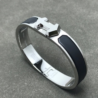 🖤 Timeless Boldness: Hermès Black “H” Clic Clac Bracelet (Silver & Matte Black)